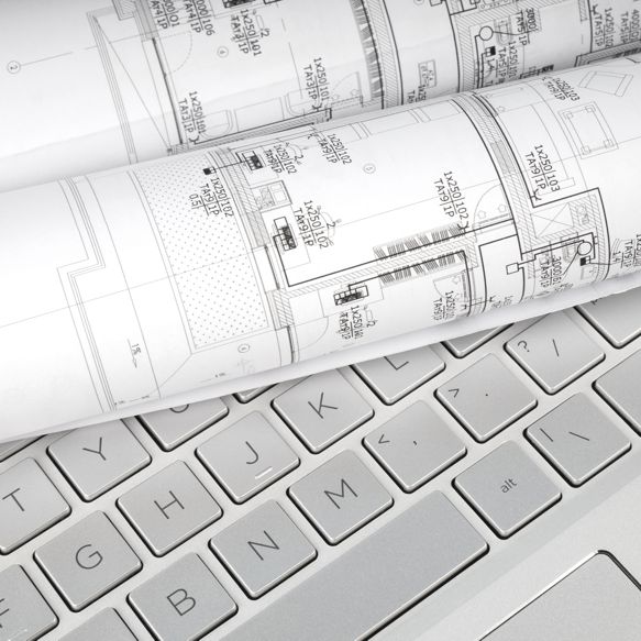 High angle view on the plan of electrical installation on computer keyboard